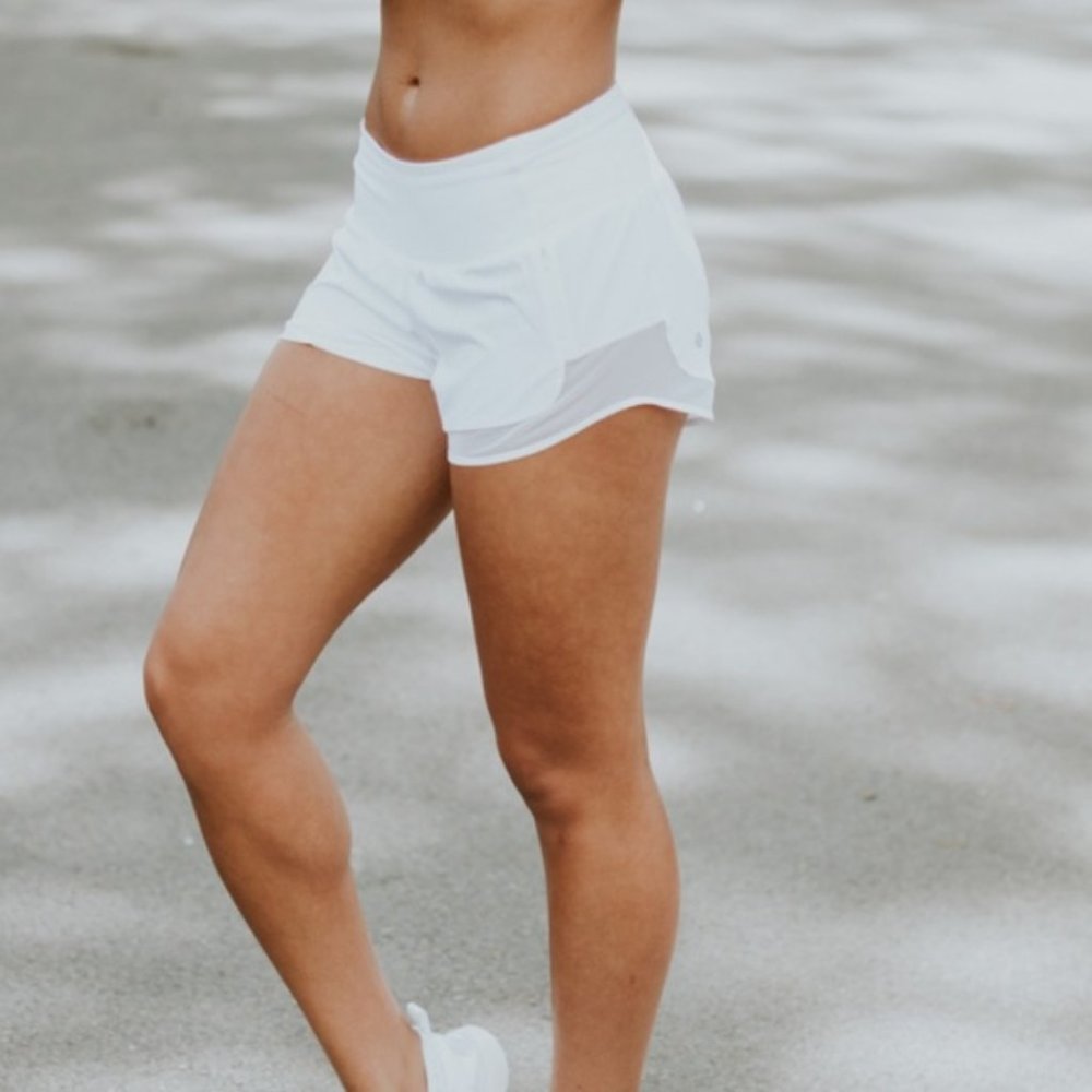 Lululemon white running shorts with mesh detail